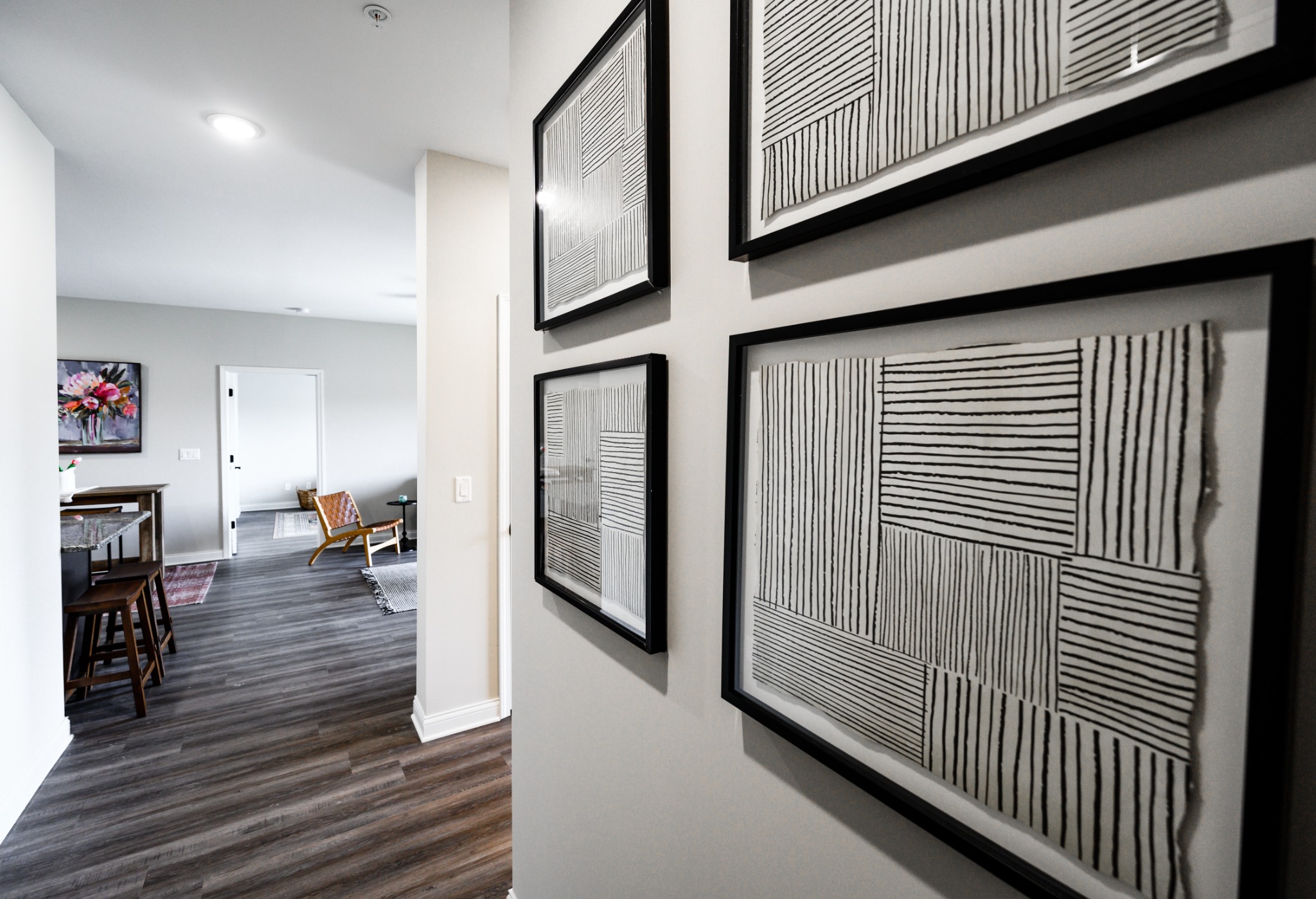 Plum Ridge apartment entry hall with hardwood-style floors
